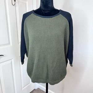 Green and black sweater